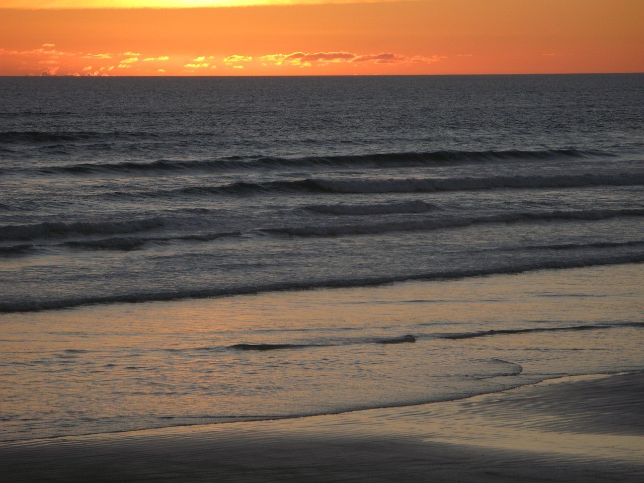 Sunset at Ninety Mile Beach - North Island New Zealand