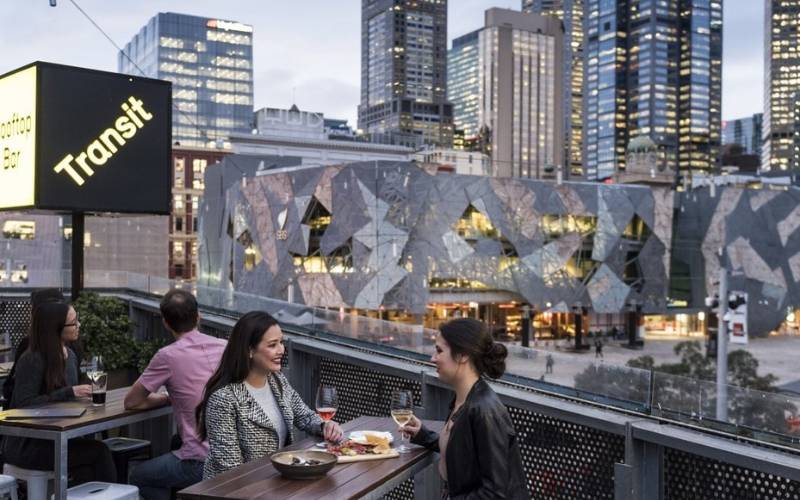 Image of a few guests at Transit Rooftop Bar.