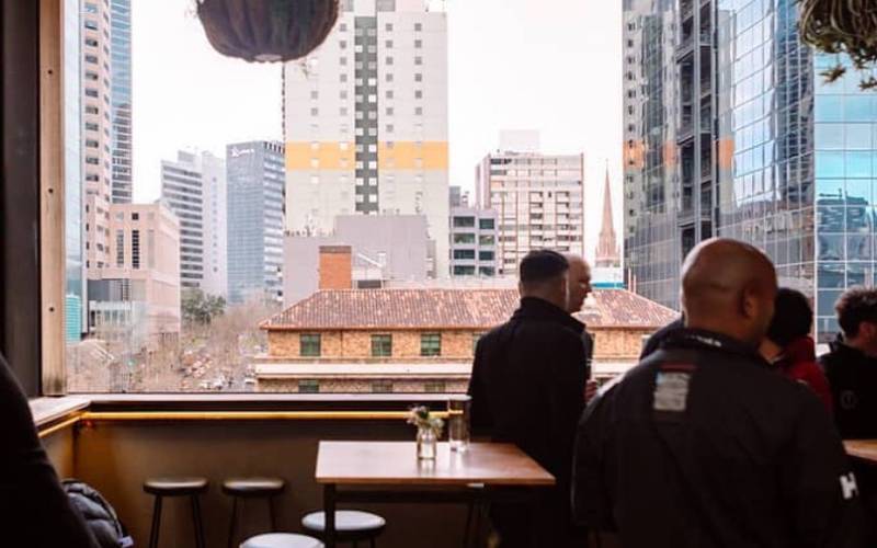 Image of patrons at Bomba Rooftop Bar.