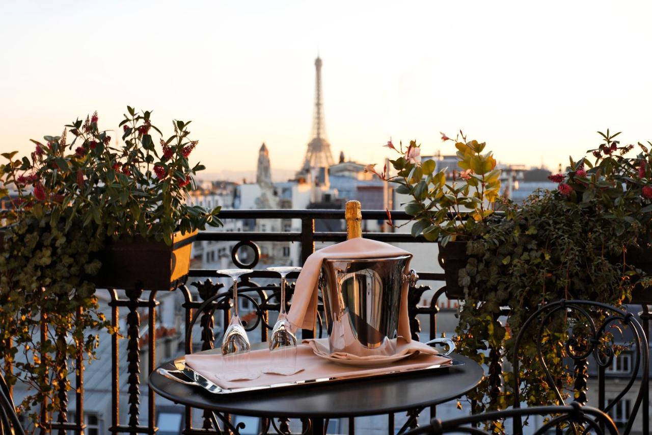 Champagne Glasses on Balcony with Eiffel Tower View