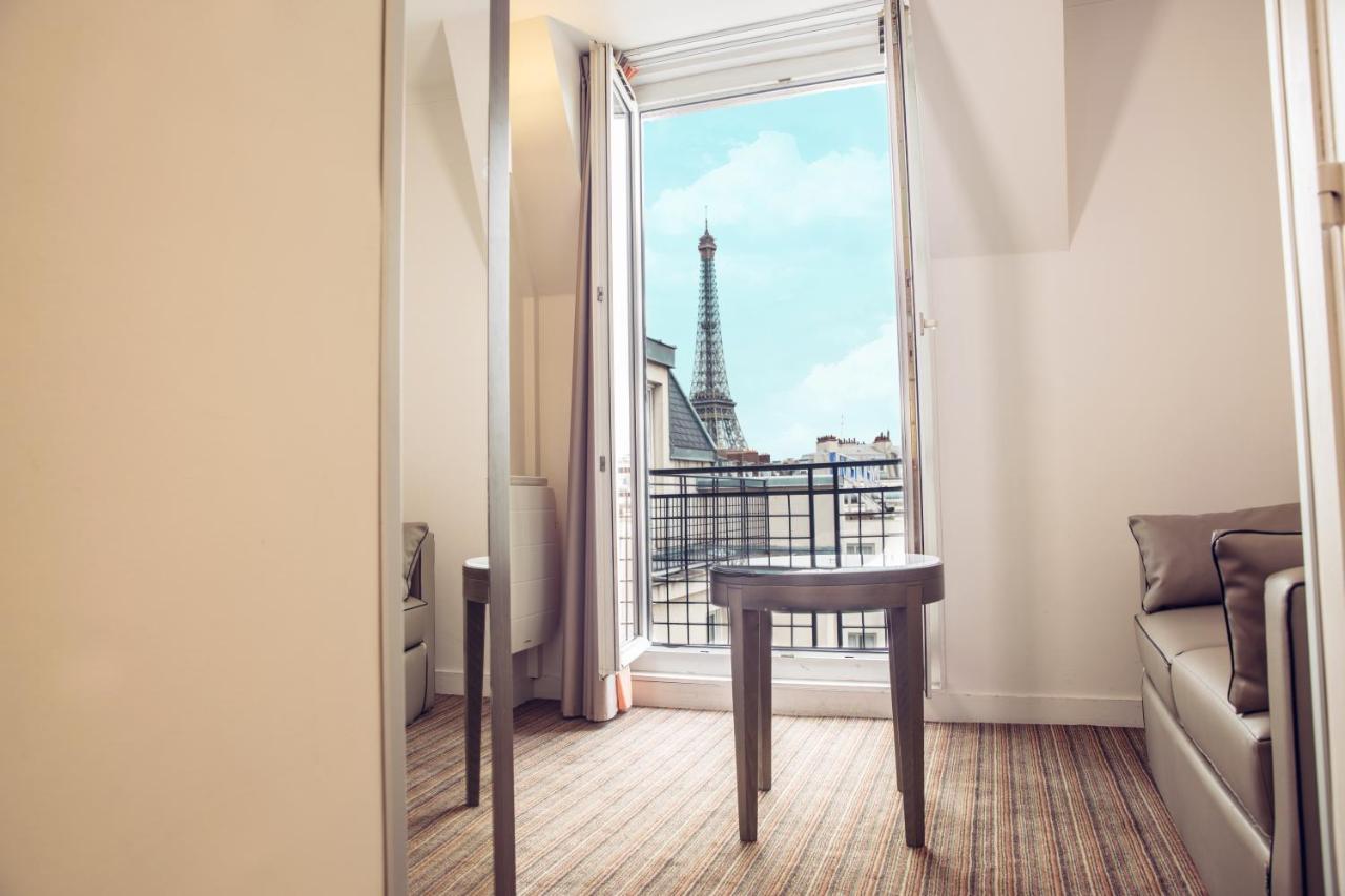 Hotel Room with Balcony Looking at Eiffel Tower