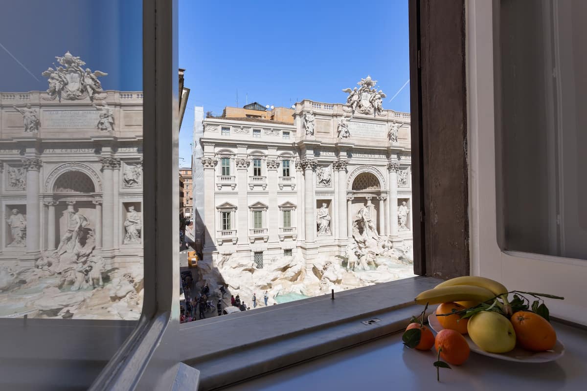 Rome Airbnb With Trevi Fountain View