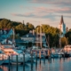 The Marina at Mackinac Island with Saint Anne's church and the historic Victorian houses a sunset shot from Lake Michigan