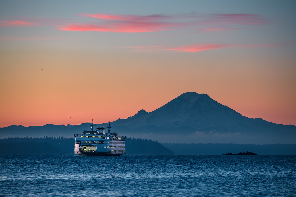 Bainbridge Island Ferry At Sunrise With Mount Rainier In The Distance