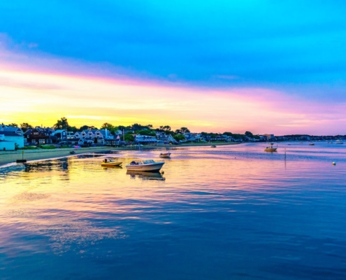 Ships and boats in the Provincetown Marina during sunset Provincetown, MA