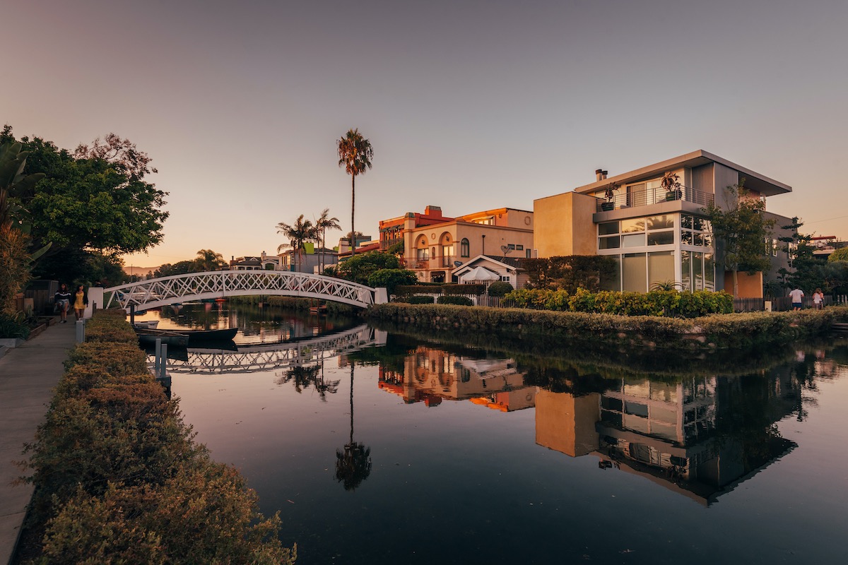 Canal and houses at sunset, in Venice Beach, Los Angeles, California