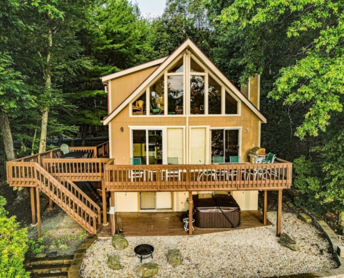 Luxury Cabins in Poconos lakefront with hot tub kayak fire pit and pool