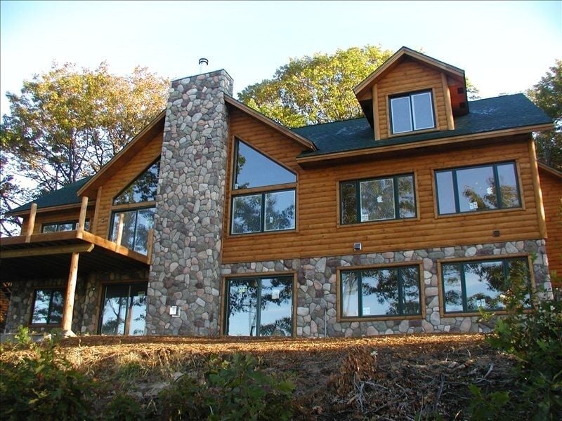 Secluded Cabins in Michigan large sleeps 20 with hot tub game room and golf