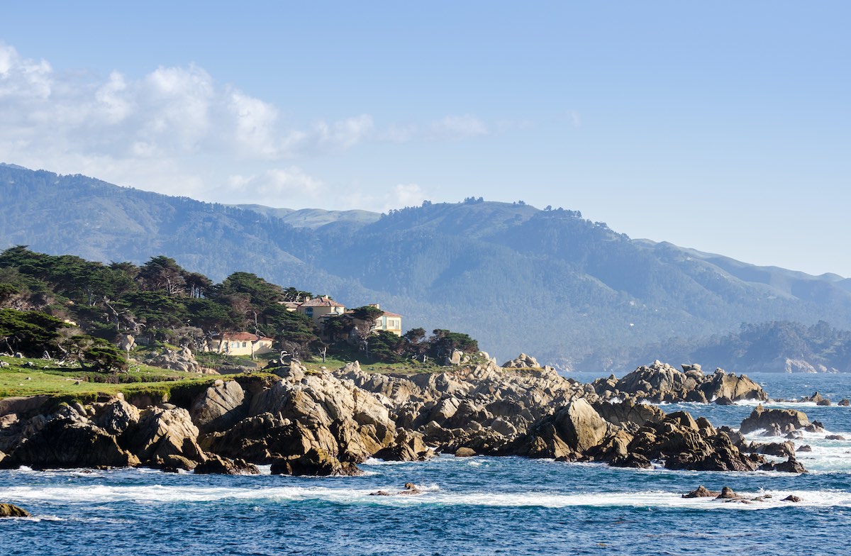 Coastline along the 17 Mile Drive in Pebble Beach of Monterey Peninsula. California. Large waves coming to rocks.