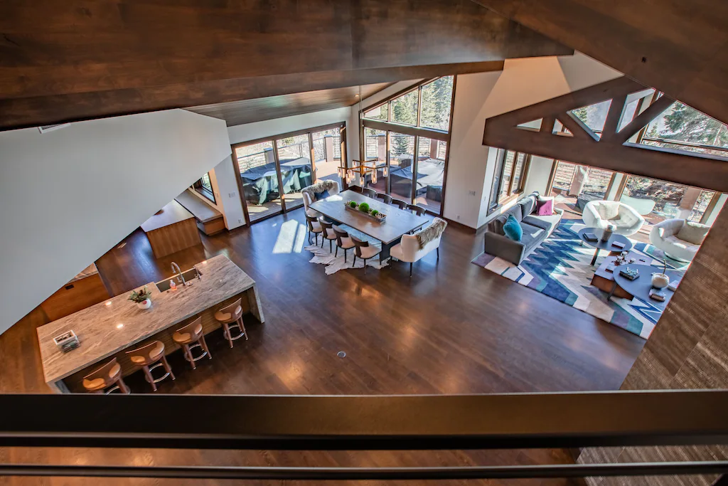 Beams frame the cabin's living room