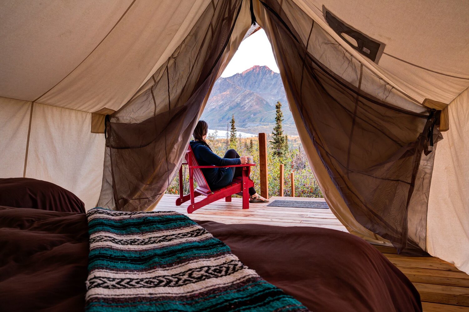 Looking out the tent to the mountains