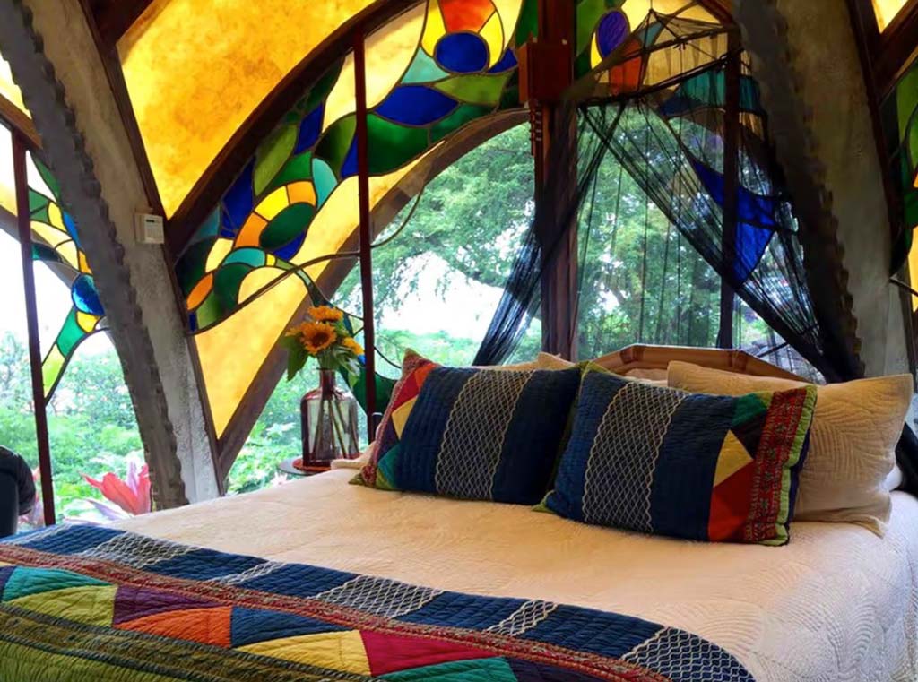 Inside of bedroom with stain glass window