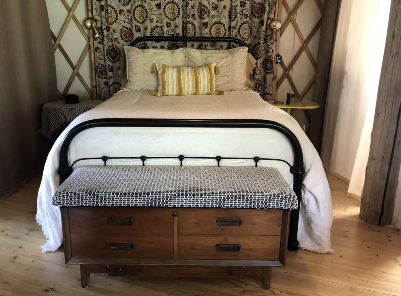 Inside a yurt with a double bed