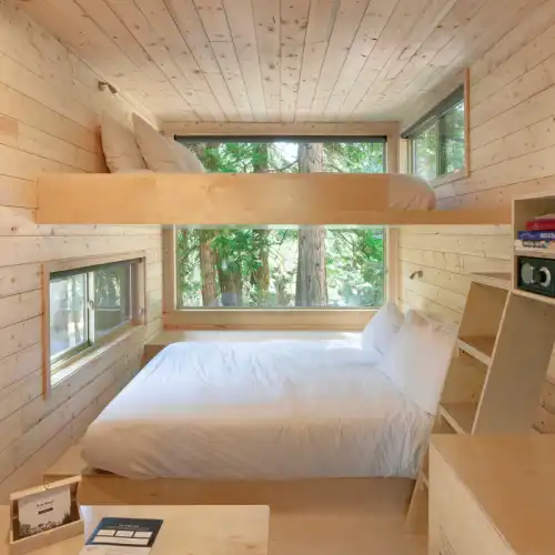 Small wooden cabin with wide windows