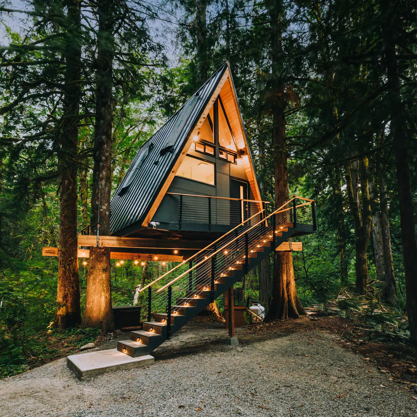 Glowing at night a-frame cabin