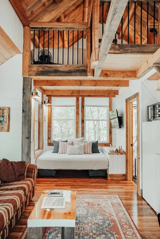 Inside a open plan cabin with a mezzanine