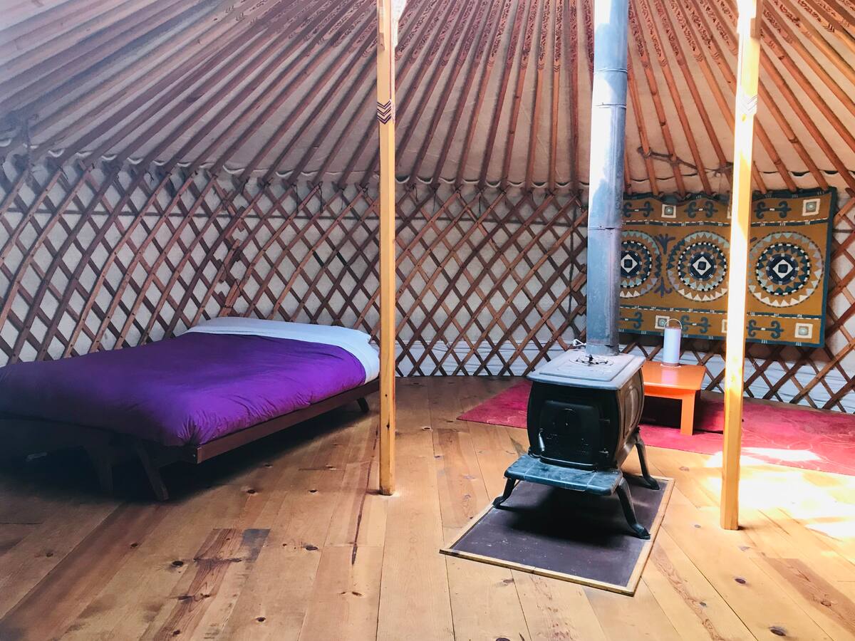 Bed inside a Yurt
